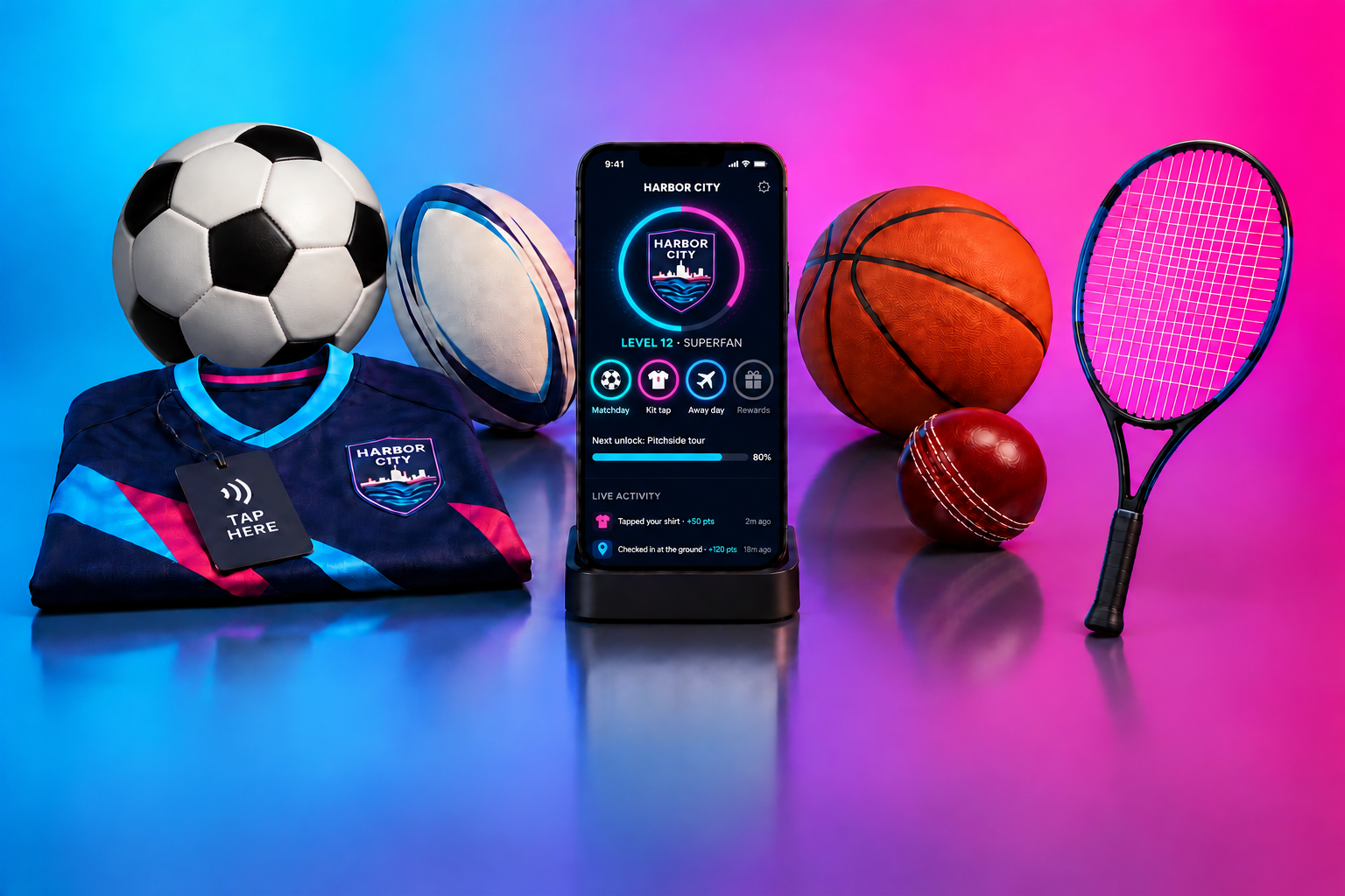 A phone standing on a dock shows a Harbor City club app with Matchday tickets, Members’ rewards and Shop the new kit, beside a folded navy shirt with a Tap Here swing tag, a football tucked behind the shirt, a rugby ball, a basketball, a cricket ball and a tennis racket