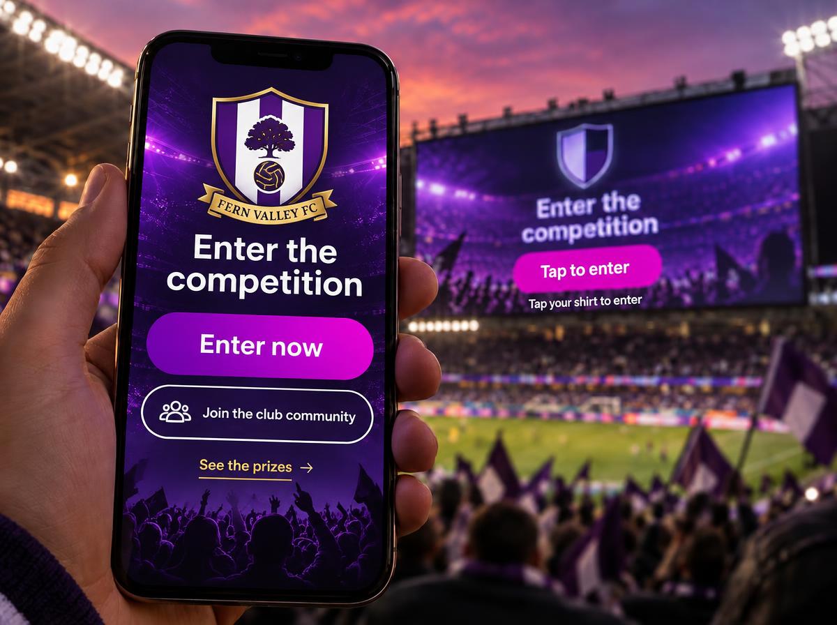 A supporter in the stands holds up a phone showing an Enter the competition portal, while the stadium big screen behind shows the same call to action at sunset